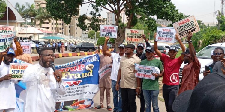 Protest And Counter-Protest Erupt At INEC HQ Over BVAS Transparency