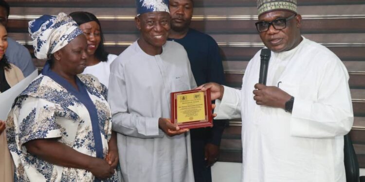 NMCO DG Obadiah Nkom Honours 6 Retiring Staffer, Former DFA