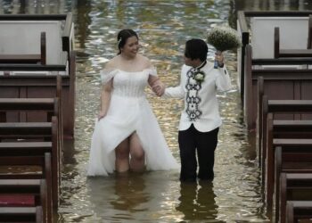 Couple Weds in Flooded Church as Love Defies the Storm