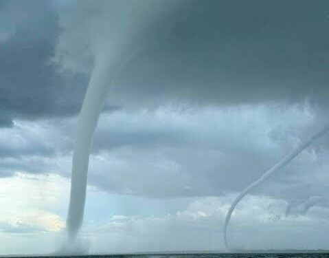 Twin Waterspouts Merge off Po River Delta