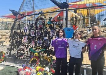 One Year On, Community Grieves Children Killed in Playground Rocket Strike