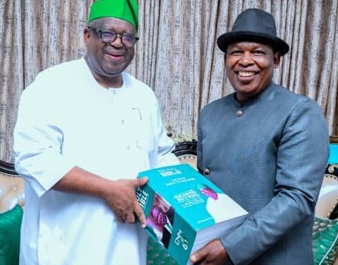 EVANG. DAN IDAKWO, BREAKS WORLD RECORD, GIFTS GOVERNOR HAND WRITTEN BIBLE