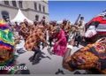 ‎Okonjo-Iweala Dances with Igbo Masquerades at WTO Open Day in Switzerland ‎