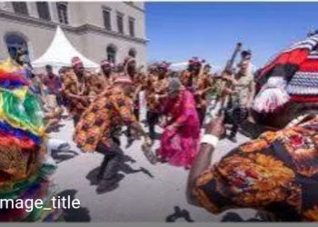 ‎Okonjo-Iweala Dances with Igbo Masquerades at WTO Open Day in Switzerland ‎