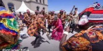 ‎Okonjo-Iweala Dances with Igbo Masquerades at WTO Open Day in Switzerland ‎